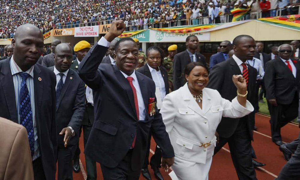 Emmerson Mnangagwa and his wife Auxillia arrive at the presidential inauguration ceremony in Harare on Friday. Photograph: Ben Curtis/AP