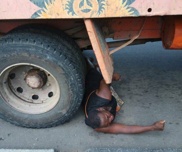 Woman Begs Trailer Driver To Crush Her To Death After Her Goods Were Seized By Government Officials In Calabar