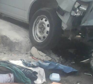 Graphic Photos: Man Crushed To Death In Obalende