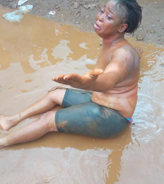 Outrage As Woman Is Stripped, Paraded, And Made To Roll In Muddied Water For Stealing Hair Extensions