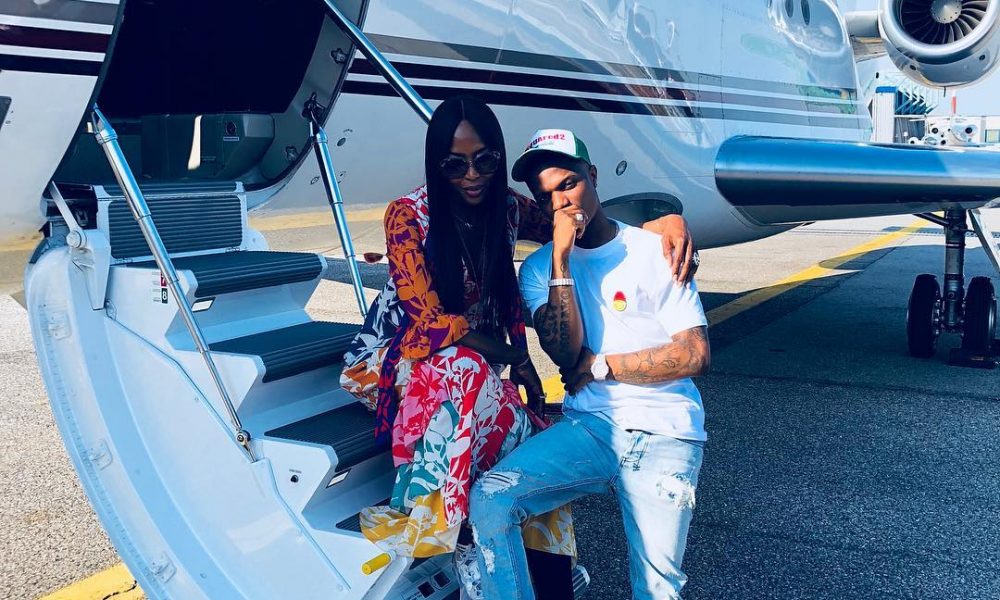 Naomi Campbell Takes Wizkid On Her Private Jet To Italy (Photos)