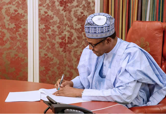 Buhari signs N8.91trn 2019 Budget Into Law