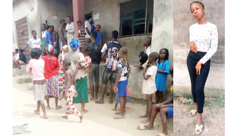 Crowd in front of the house of the igbo girl beaten to death by her parents