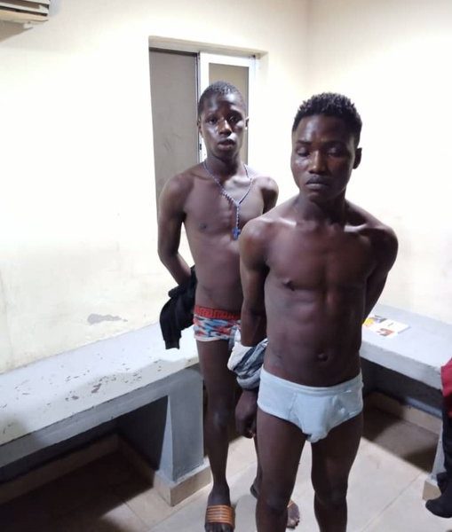 Two Lagos street light vandals being paraded by the police