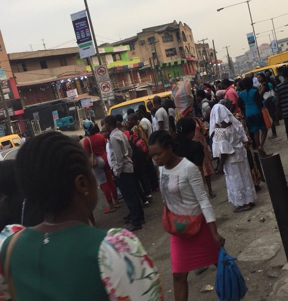 Lagosians stranded at bus stops due to scarcity of buses