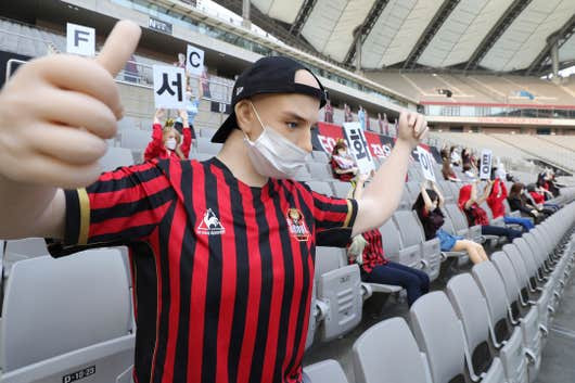 South Korea using mannequins to fill space during football match
