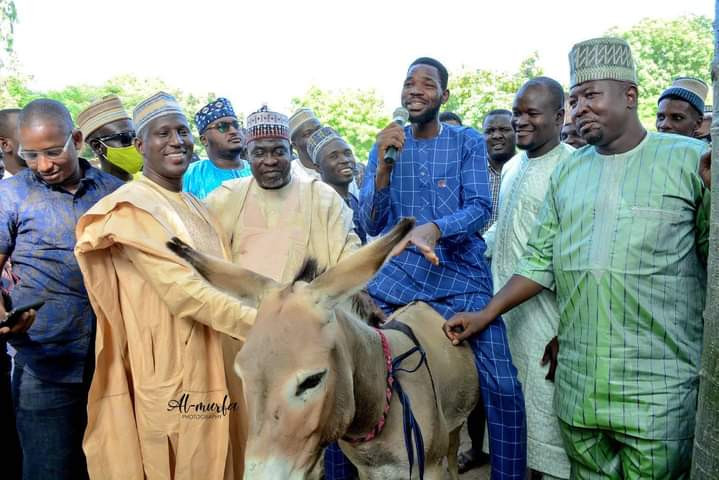 Governor Ganduje's Aide Shares Donkey, Other Items To Empower Kano Youths