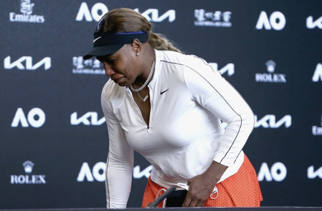 This hand out photo released by the Tennis Australia on February 18, 2021 shows Serena Williams of the US gets emotional at a press conference after losing her women’s semi-final match against Japan’s Naomi Osaka on day eleven of the Australian Open tennis tournament in Melbourne. (Photo by ROB PREZIOSO / TENNIS AUSTRALIA / AFP)