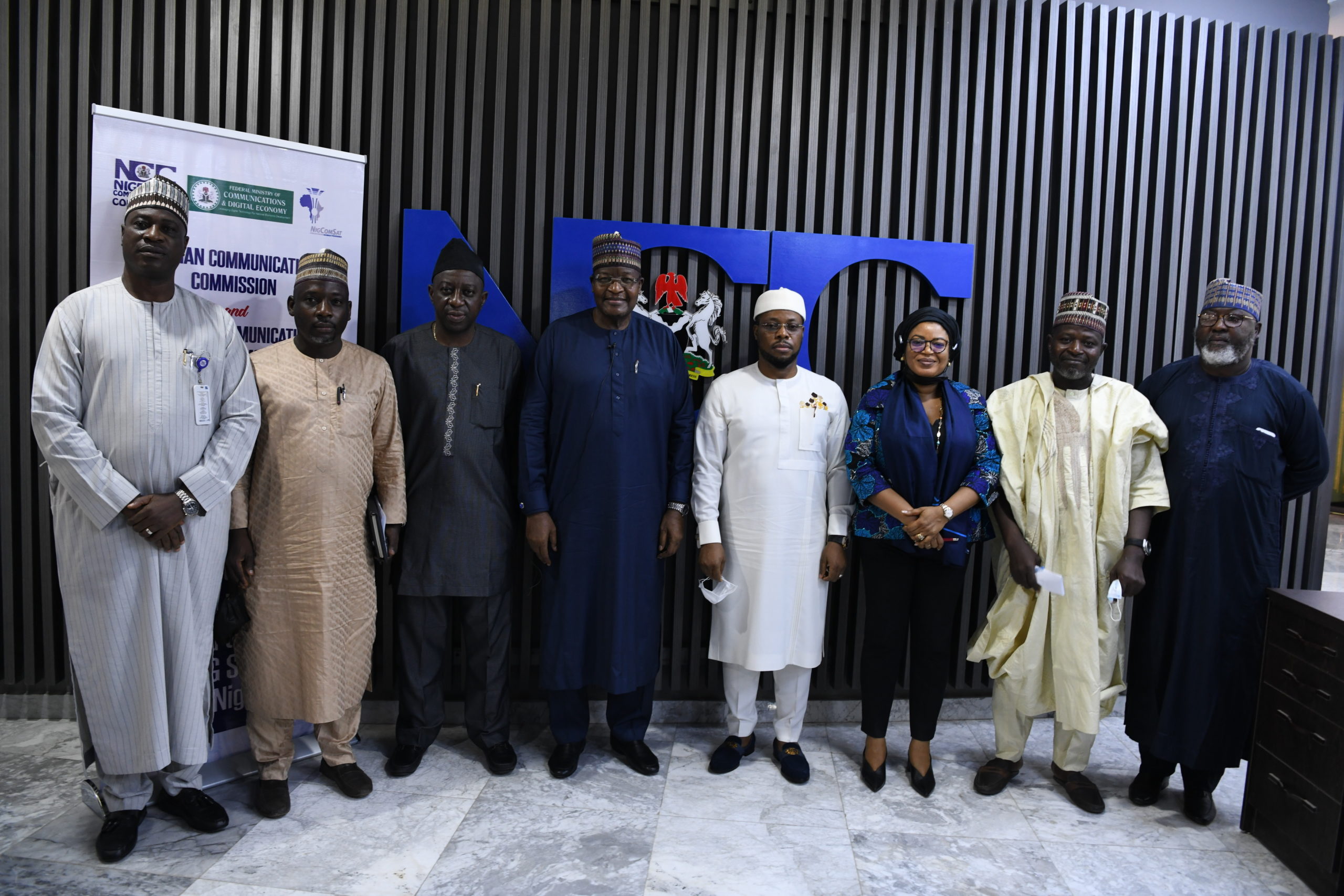 L-R: Engr. Oluwatoyin Asaju, Director, Spectrum Administration, Nigerian Communications Commission (NCC); Mr. Hadi Muhammad, Executive Director, Finance and Accounts, Nigerian Communications Satellite (NIGCOMSAT); Mr. Adeleke Adewolu, Executive Commissioner, Stakeholder Management, NCC; Prof. Umar Garba Danbatta, Executive Vice Chairman/CEO, NCC; Chief Uche Onwude, Member, NCC Board of Commissioners; Dr. Abimbola Alale, Managing Director, NIGCOMSAT; Prof Abdu Bambale, Executive Director, Technical, NIGCOMSAT, and Engr. Ubale Maska, Executive Commissioner, Technical Services, NCC, during the signing of a Memorandum of Understanding (MoU) on Fifth Generation (5G) spectrum on Wednesday in Abuja.