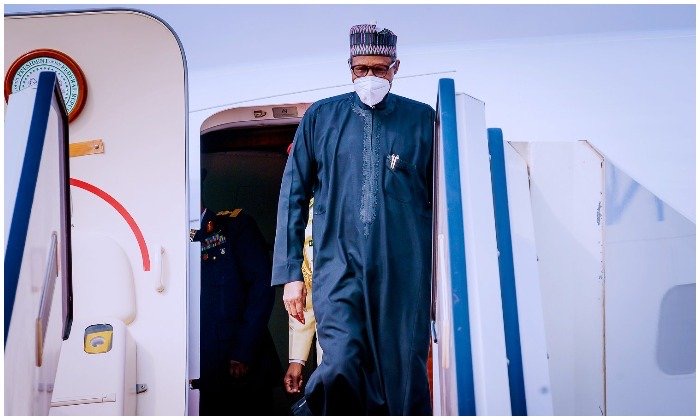 Buhari Returns To Abuja After Attending African Finance Summit In France