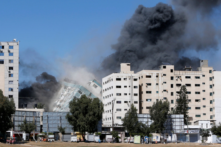 Gaza tower housing AP, Al Jazeera collapses after missile strike in Gaza city, May 15, 2021. [PHOTO: TW @AJEnglish]