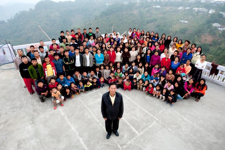 A photograph of the Chana family on January 30, 2011, in Baktawang, Mizoram, India [File: Richard Grange/Barcroft India/Getty Images]