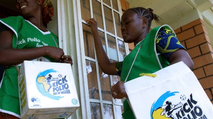 Volunteer health workers wait to immunize children at a school in Abuja, Nigeria, in 2010.Afolabi Sotunde / Reuters)