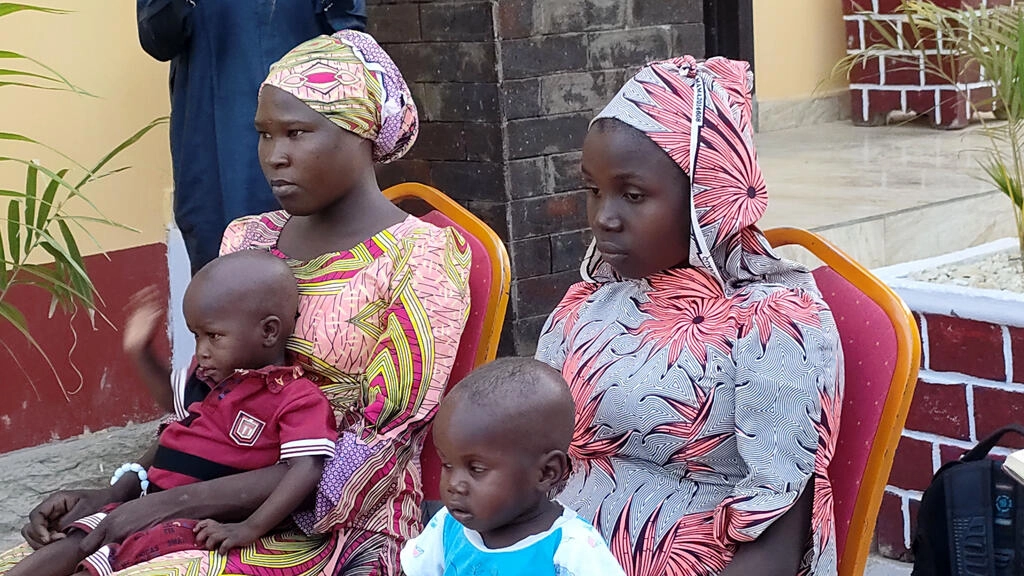 Kidnapped Chibok schoolgirls Mary Dauda (L) and Ha